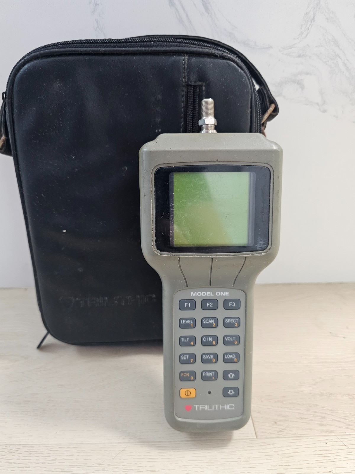 Trilithis Model One cable signal level meter with charger and case