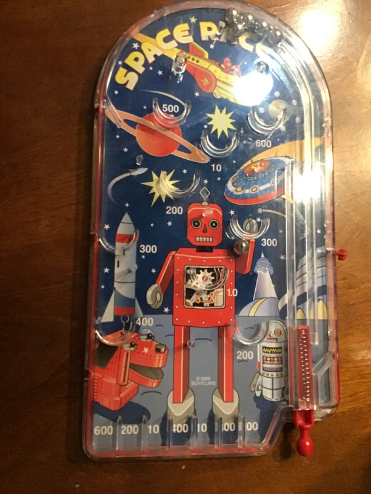 Schylling metal pinball game new no box space robot version