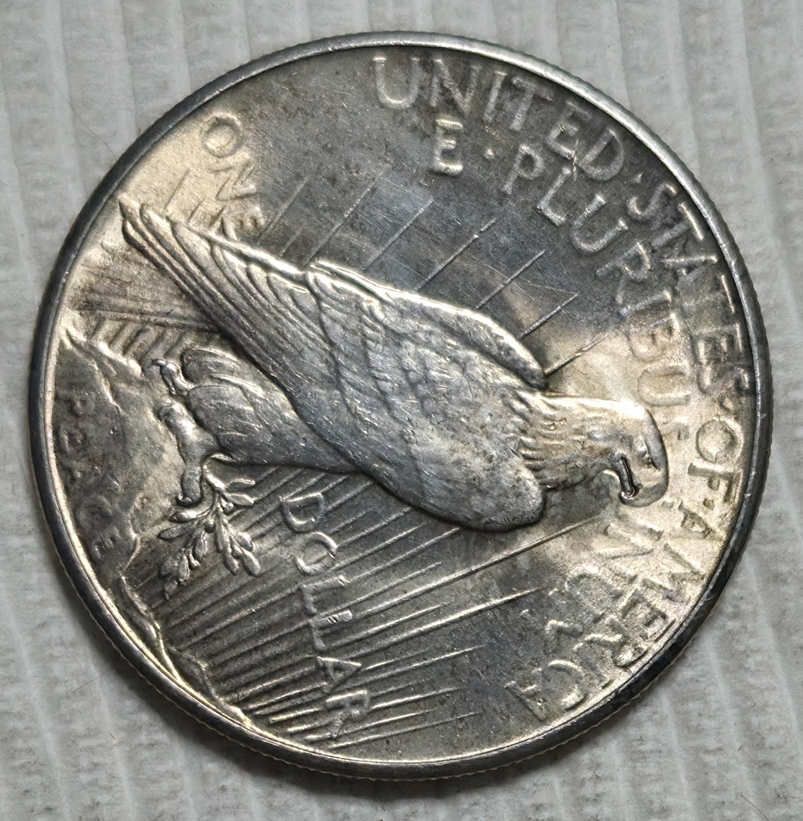 1935 P Peace Silver Dollar. Estimated Almost Uncirculated 58. A0989.