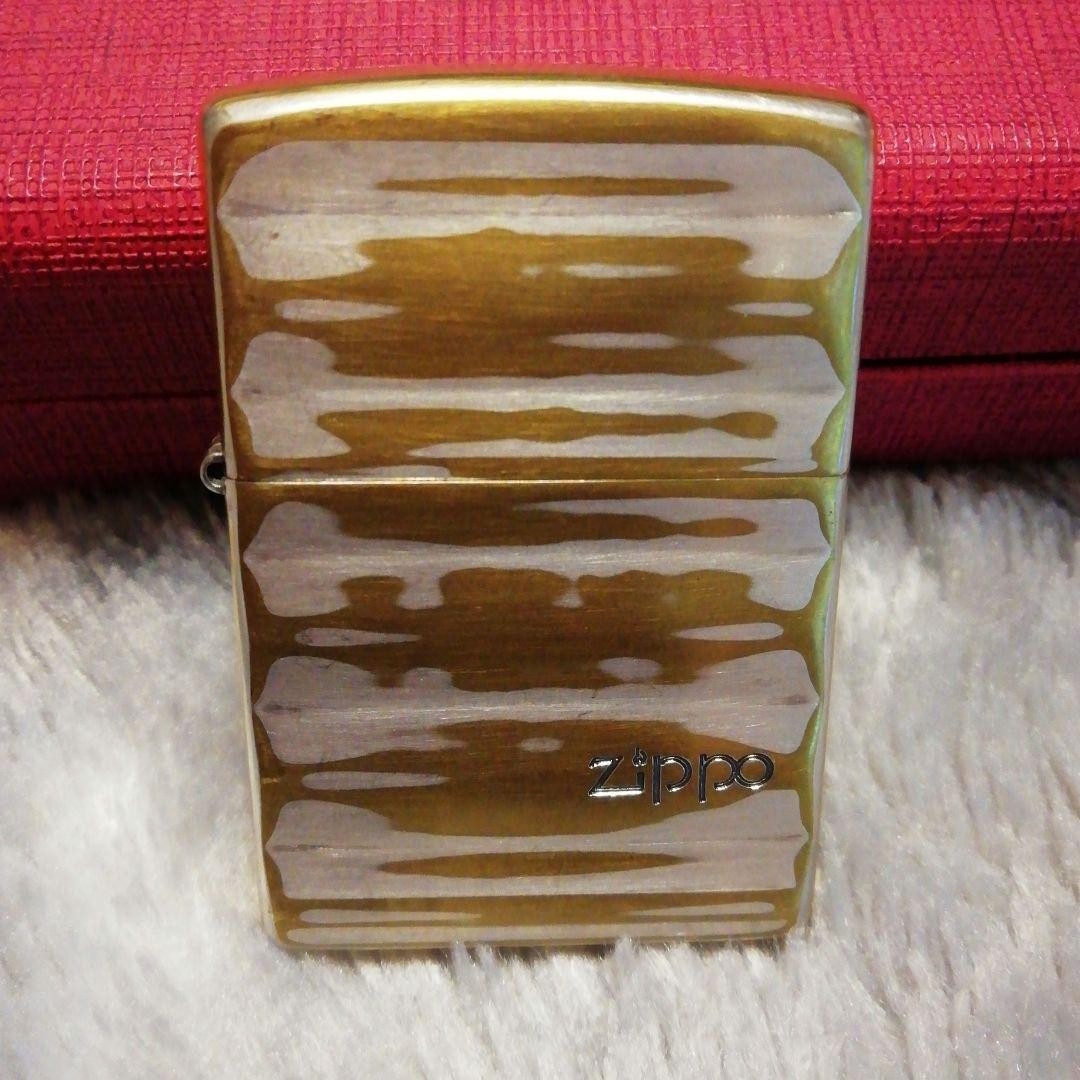 Zippo lighter, double-sided design, made in 2002.
