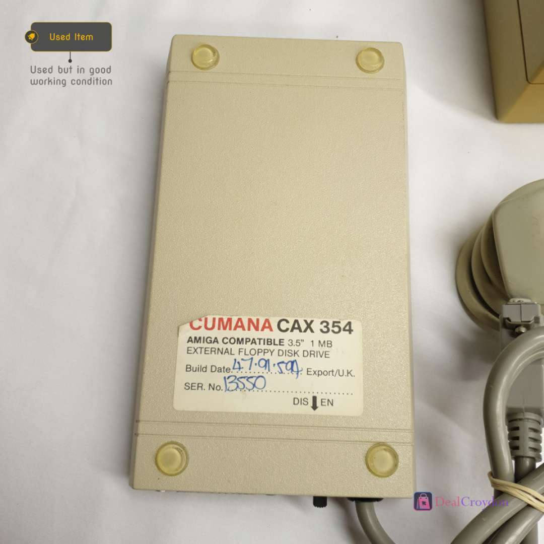 COMMODORE AMIGA A500 COMPUTER +COMMODORE A520 +MOUSE + 10 DISKS + POWER SUPPLY
