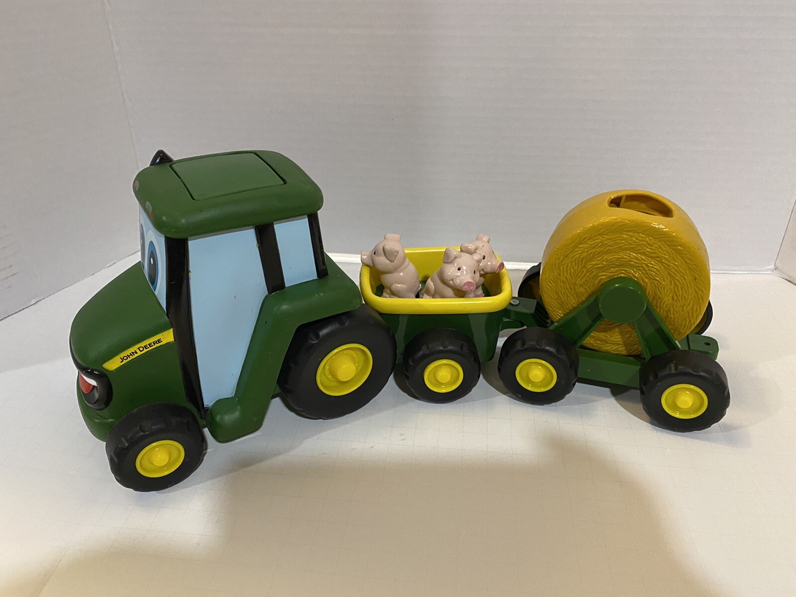 John Deere Rubber & Plastic Three Pc Tractor Set. Push Button & Music Plays