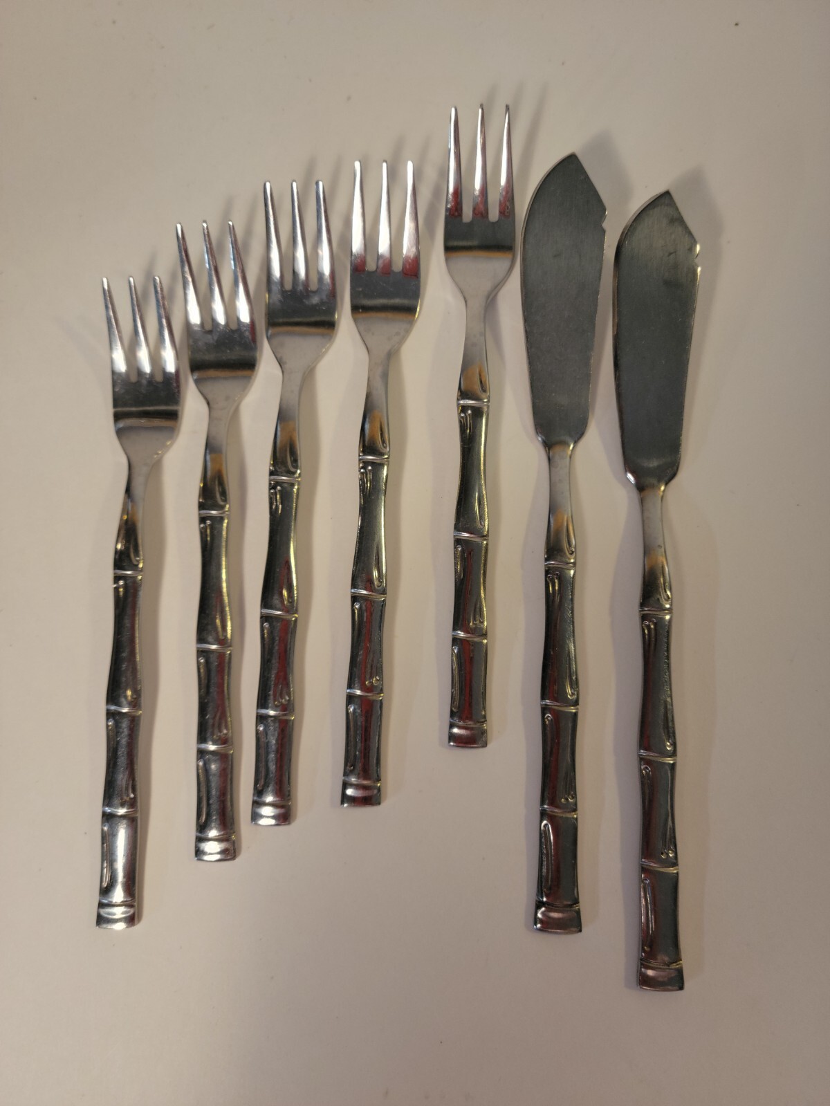 5 Stainless Korea Pickle/Olive Forks and 2 Butter & Cheese Knives