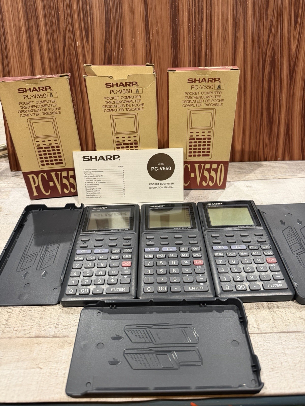 Lot of 3 Sharp PC-V550A Pocket Computers w/ Box & Manual FOR PARTS NOT WORKING