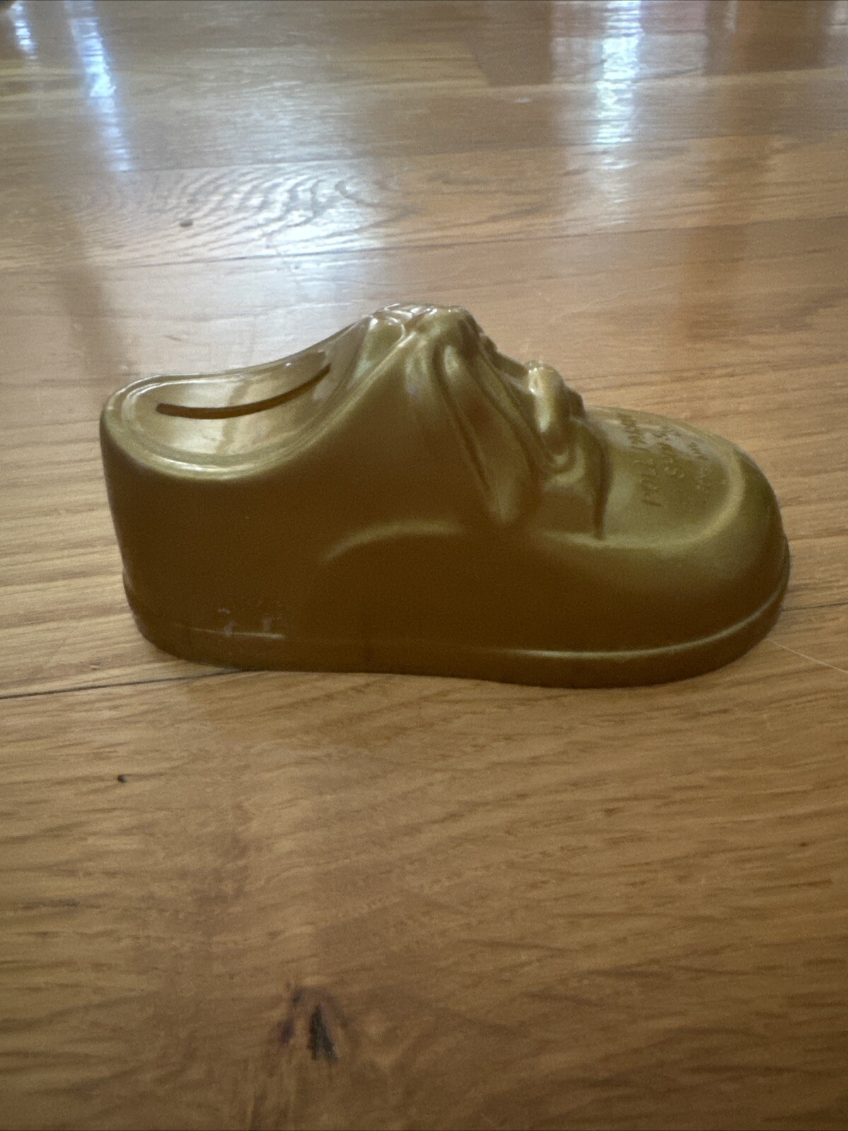 Vintage Small Piggy Bank plastic BABY SHOE poll parrot shoes Advertising Gold