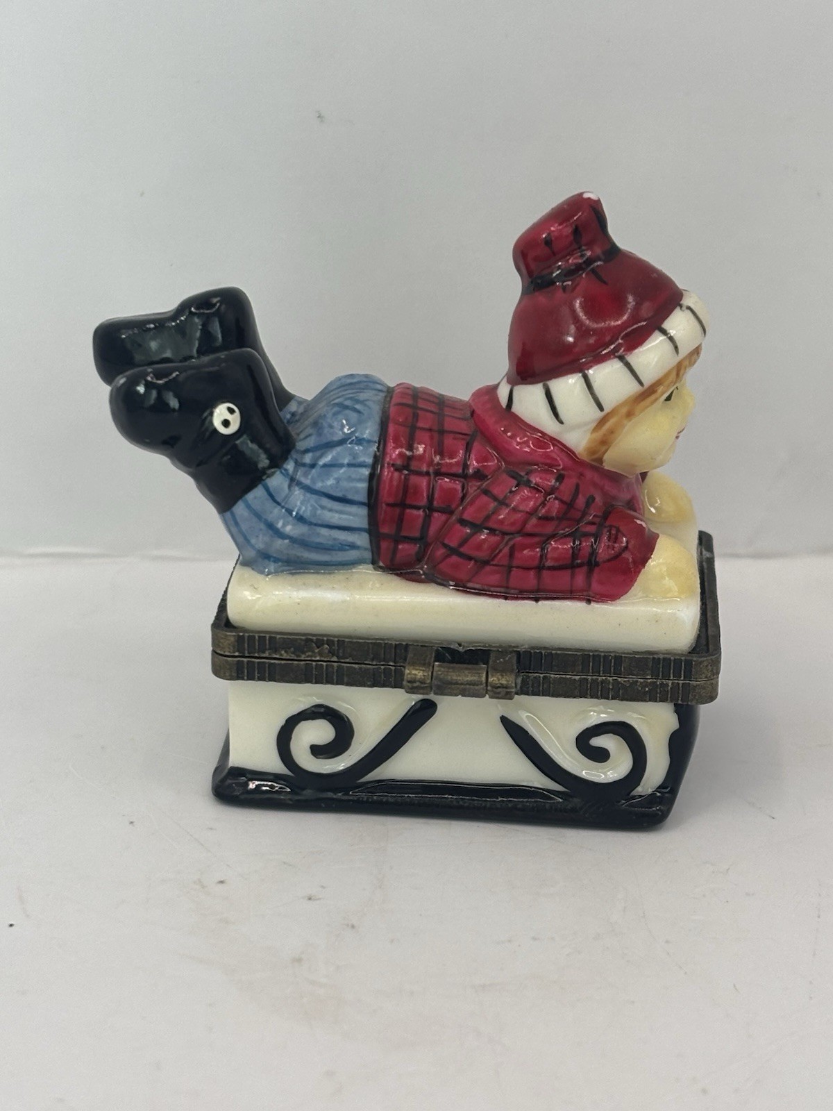 Ceramic Boy On Sled Hinged Trinket Box 2.5”