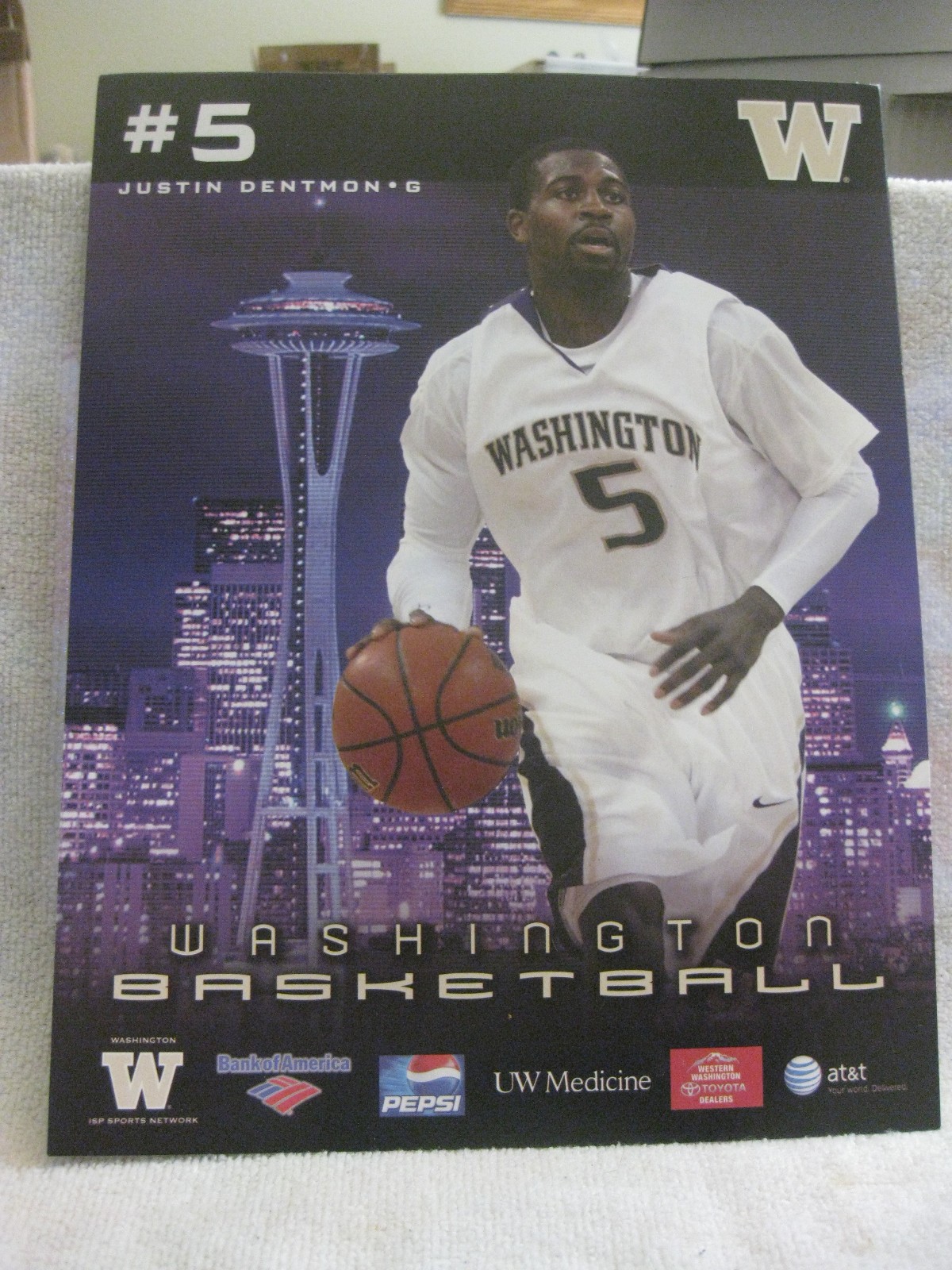 Washington Huskies basketball program [Justin Dentmon #5] one page cardboard