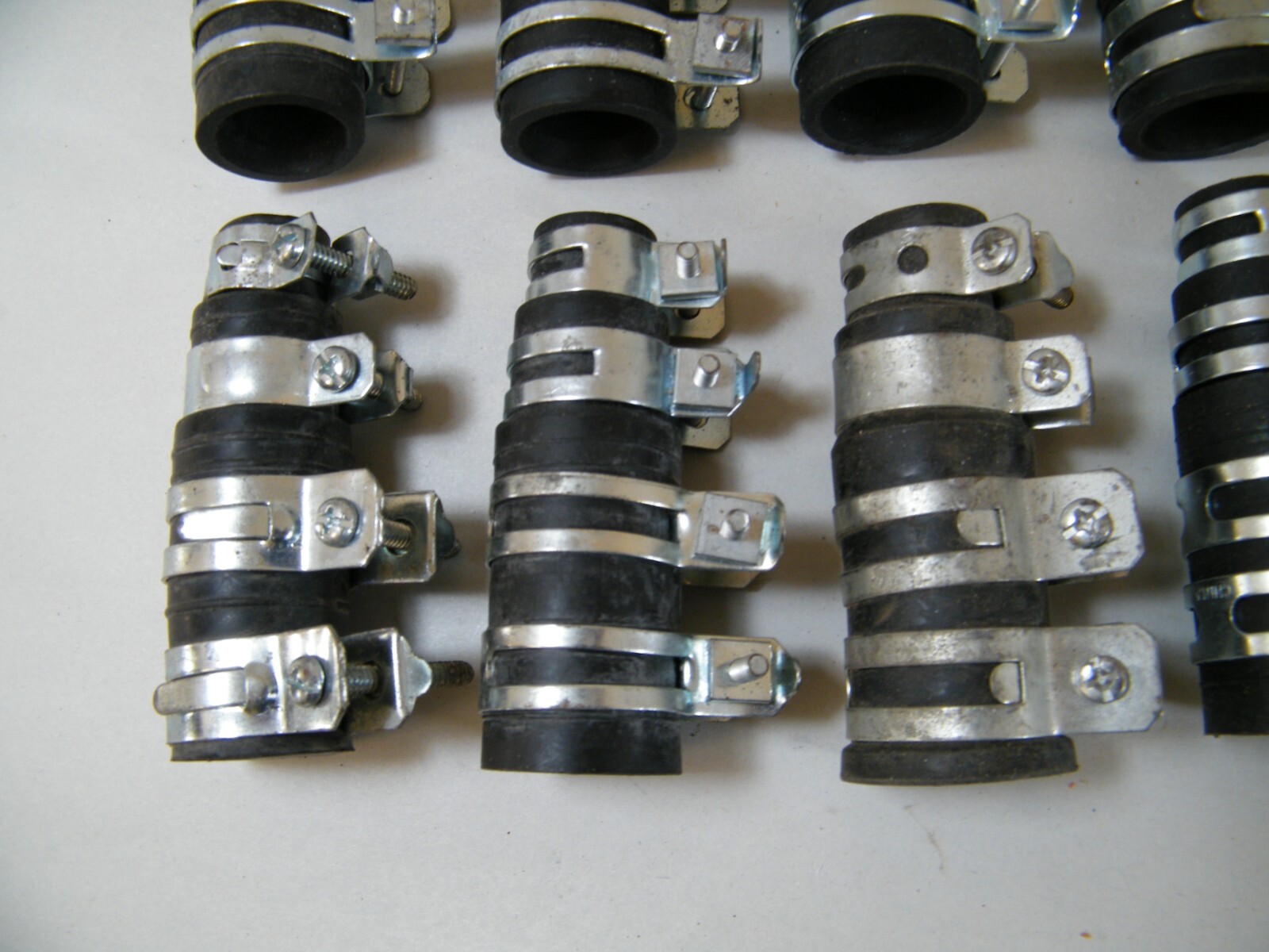 (13) DISHWASHER DISPOSAL CONNECTOR RUBBER WITH 4 STEEL CLAMPS