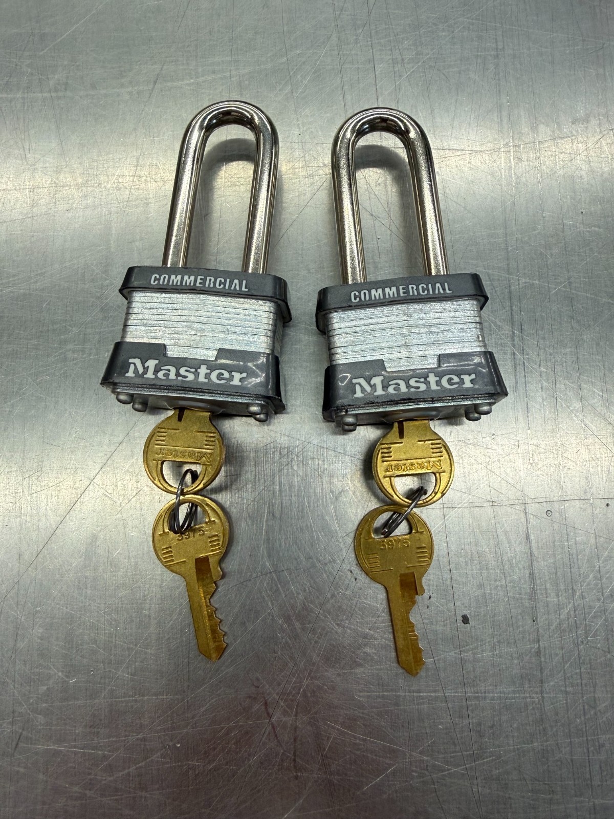 Master Lock Commercial Padlocks Pair Keyed Alike Long Shackle Laminated Steel
