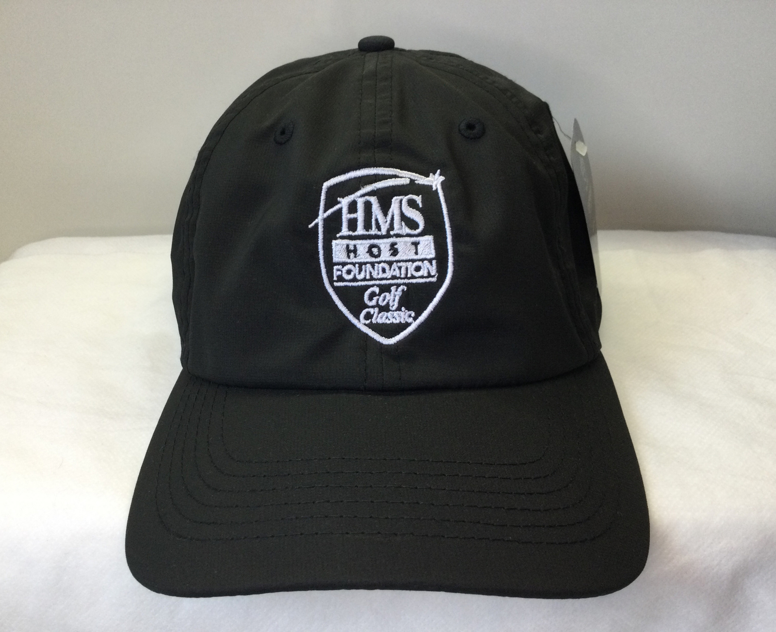 Golf Classic Strapback Hat HMS Host Foundation Solid Black Shield Logo NWT