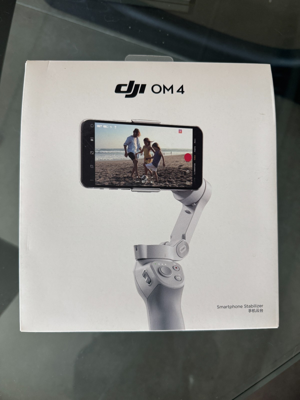 DJI OM 4 smartphone gimbal stabilizer kit.