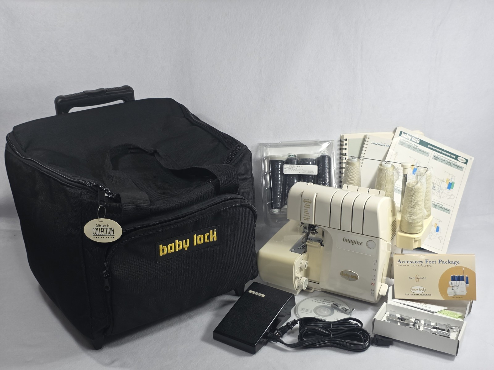 Baby Lock Imagine BLE1AT Serger Sewing Machine Self Thread w/ Travel Bag, EXTRAS