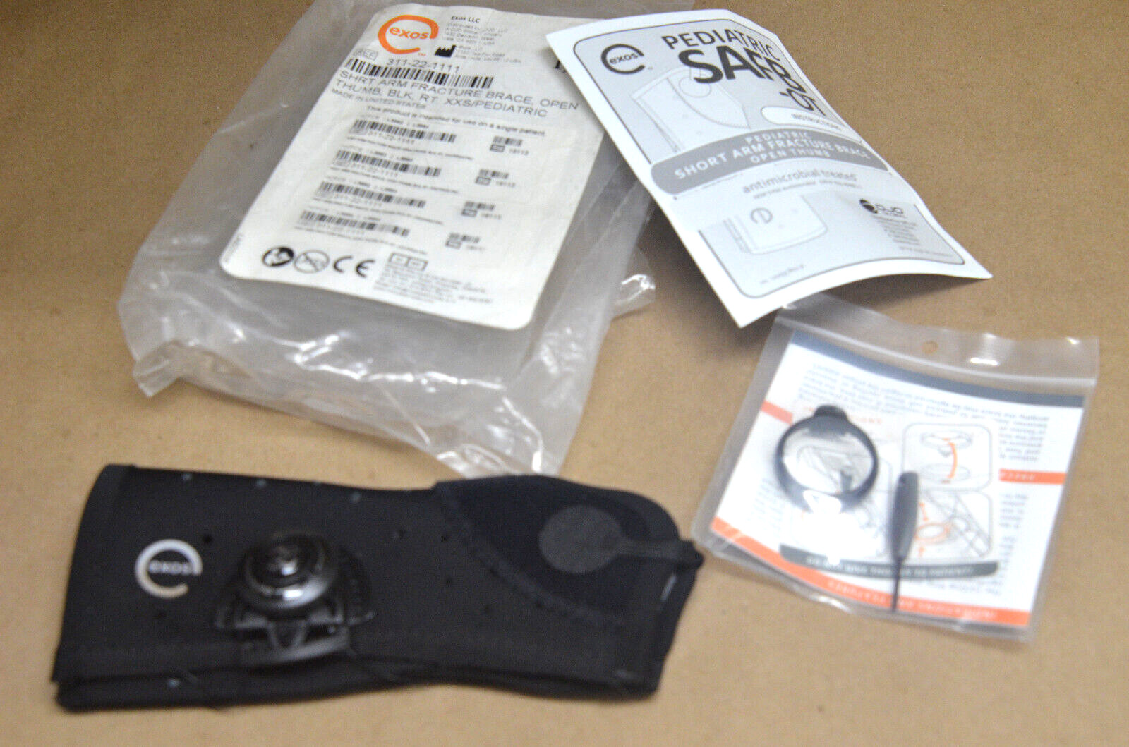 Exos Short Arm Fracture Brace-Open Thumb XXS RT, Blk 311-22-1111        (U-A)
