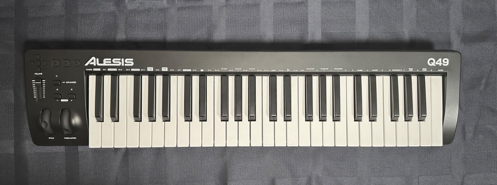 Alesis Q49 MK2   49-note keyboard controller. USB-MIDI and traditional MIDI