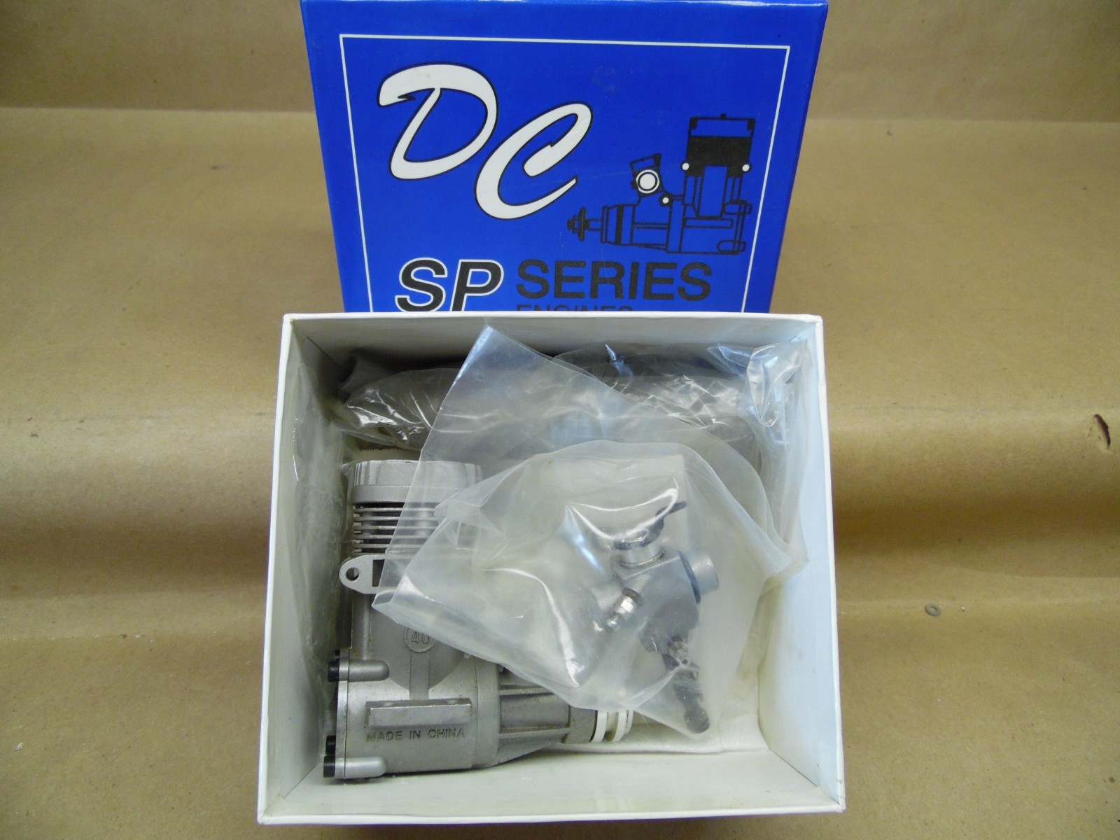 NEW Direct Connection DC, SP series .40A engine....w/muffler, orig. box & papers