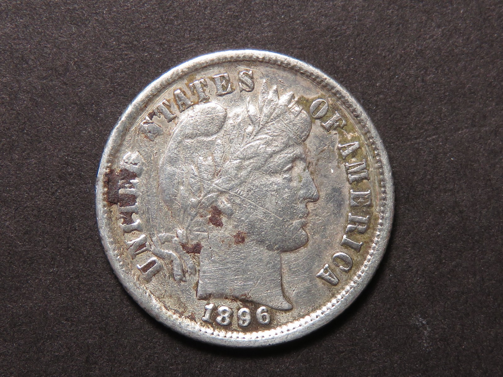 1896-P Barber Dime With VF/XF Details; Scratched and Harshly Cleaned