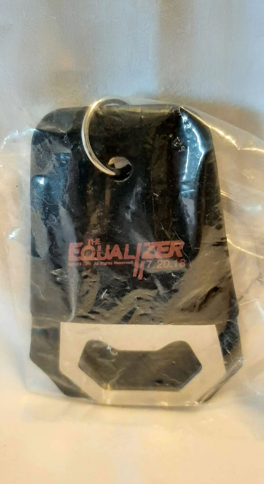 The Equalizer 7/20/18 bottle opener keychain.