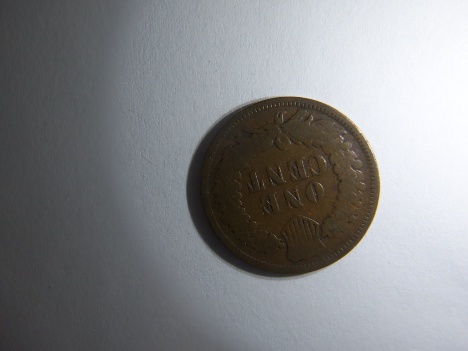 A KEY 1875 INDIAN HEAD PENNY