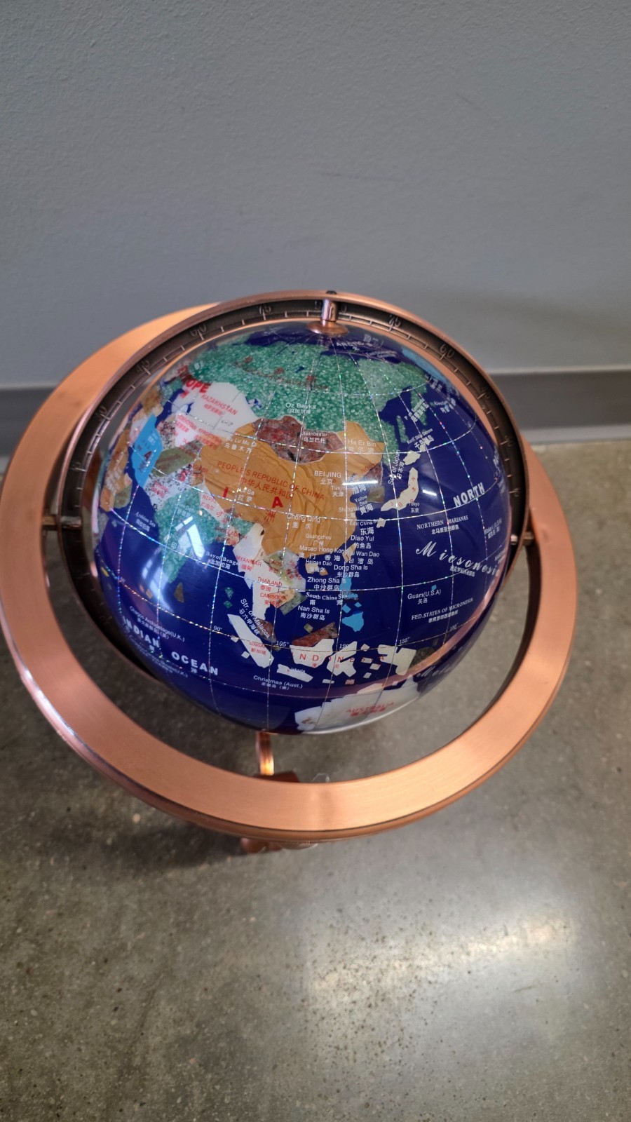World Globe - Plastic Copper Rotating Base. From China