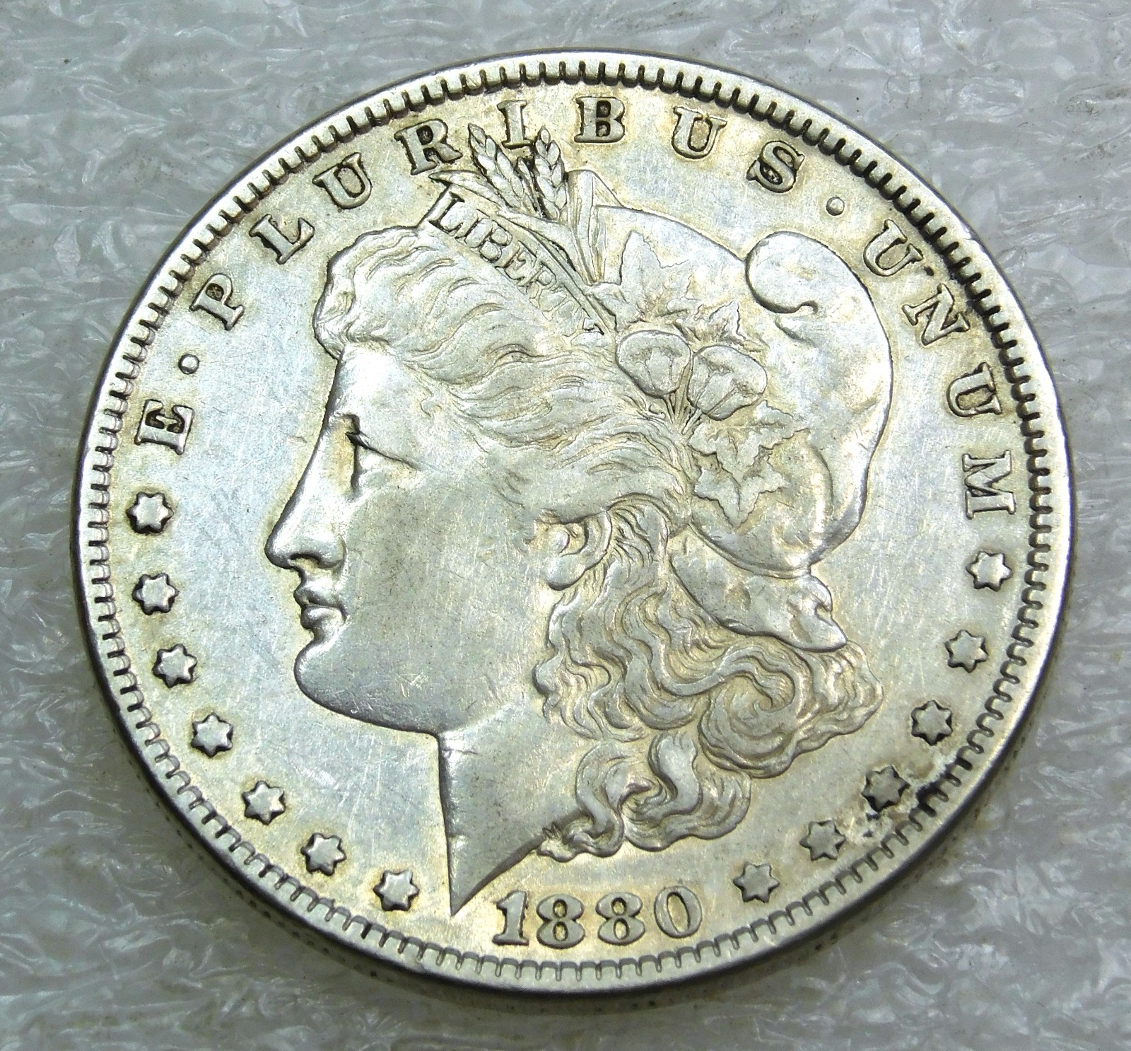 1880 P Morgan Silver Dollar XF Frosty Luster in saflip #K457