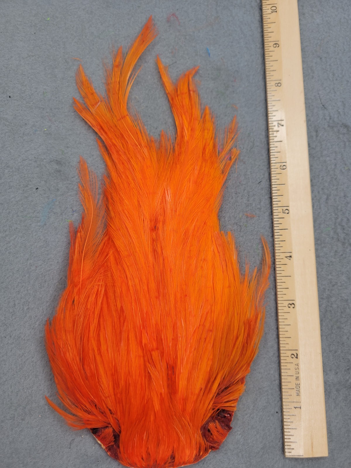 Lot 328, Grade B, DYED BRIGHTER ORANGE India Rooster Streamer Neck Cape Feathers