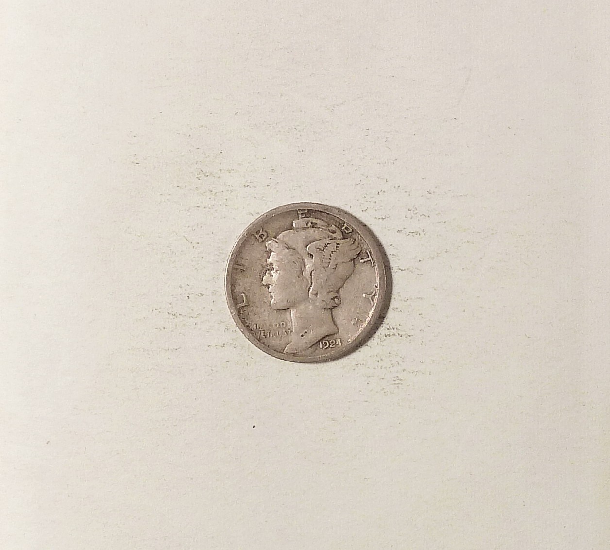 1924-S Silver Mercury Dime grades VF, Light Toning, Better Collector Date.