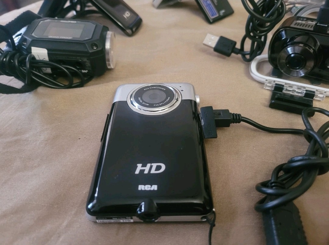 TEN Portable Handheld Camcorders In (Excellent Condition) w/ cords and case