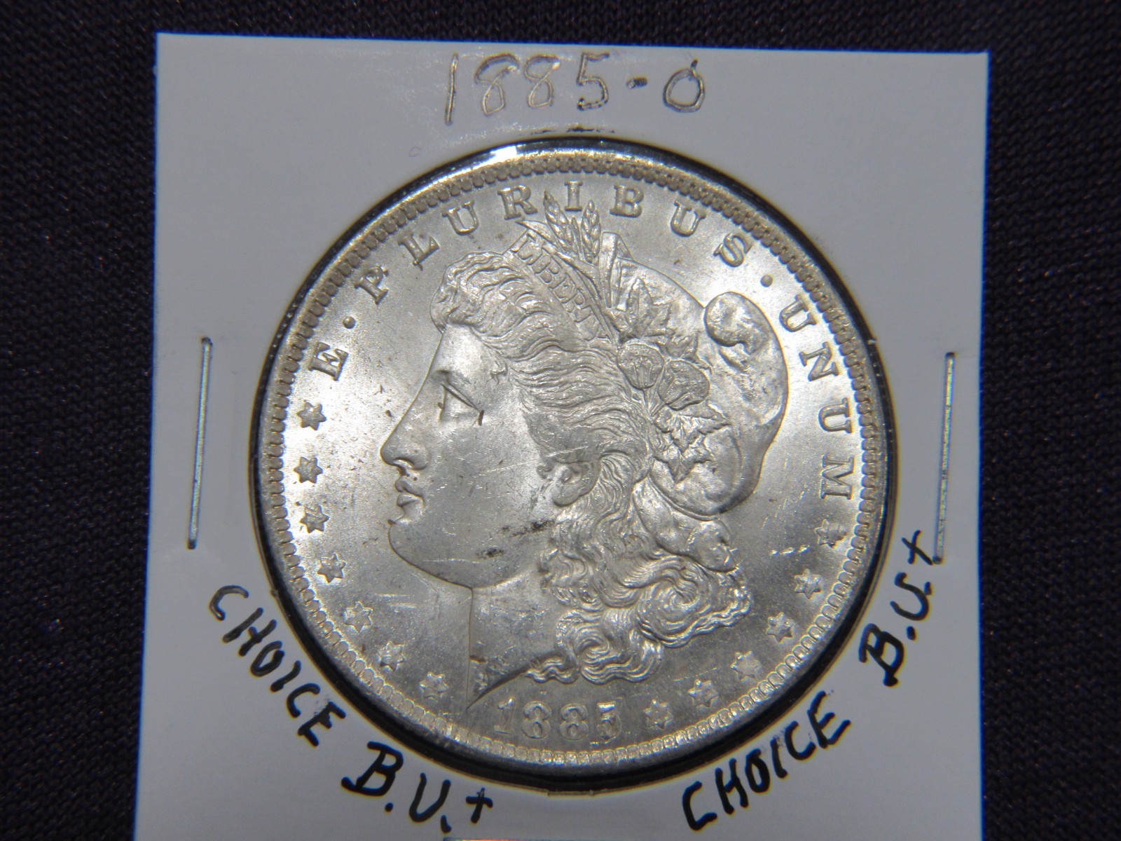 1885-O Morgan dollar in choice B.U.+ condition