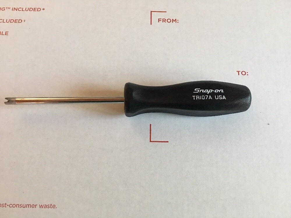 Snap-on Tire Valve Core Tool. Black in color.