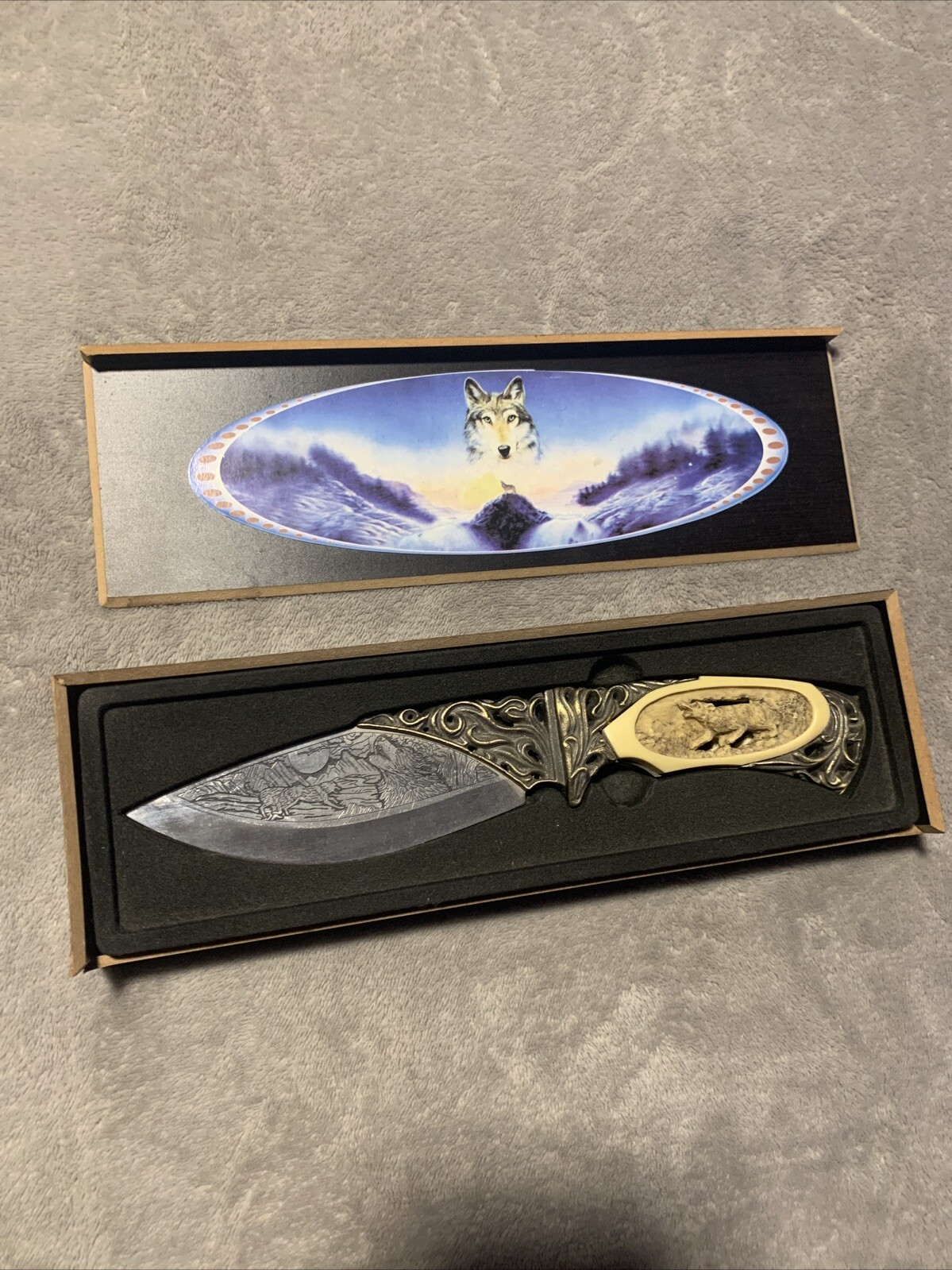 Carved Wolf Collectors Edition Knife With Etched Blade in Box
