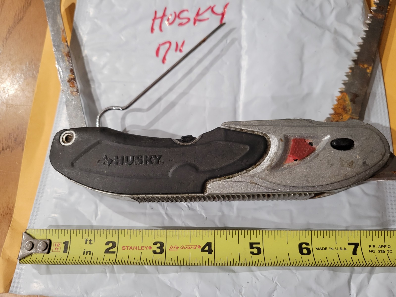 HUSKY 7" MULTI TOOL/KNIFE/ FISHING TOOL GOOD SHAPE
