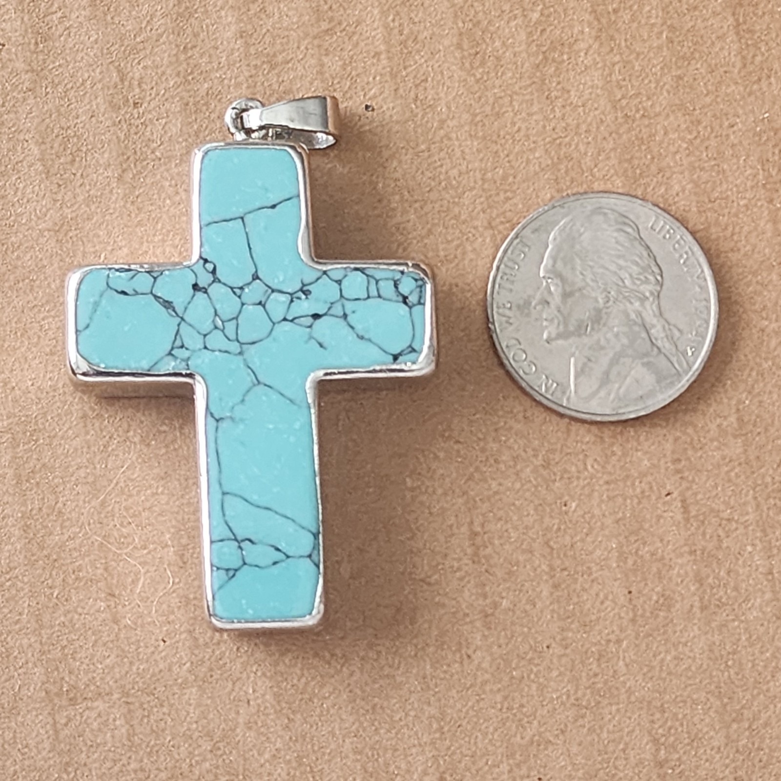 Beautiful Turquoise colored Cross Charm