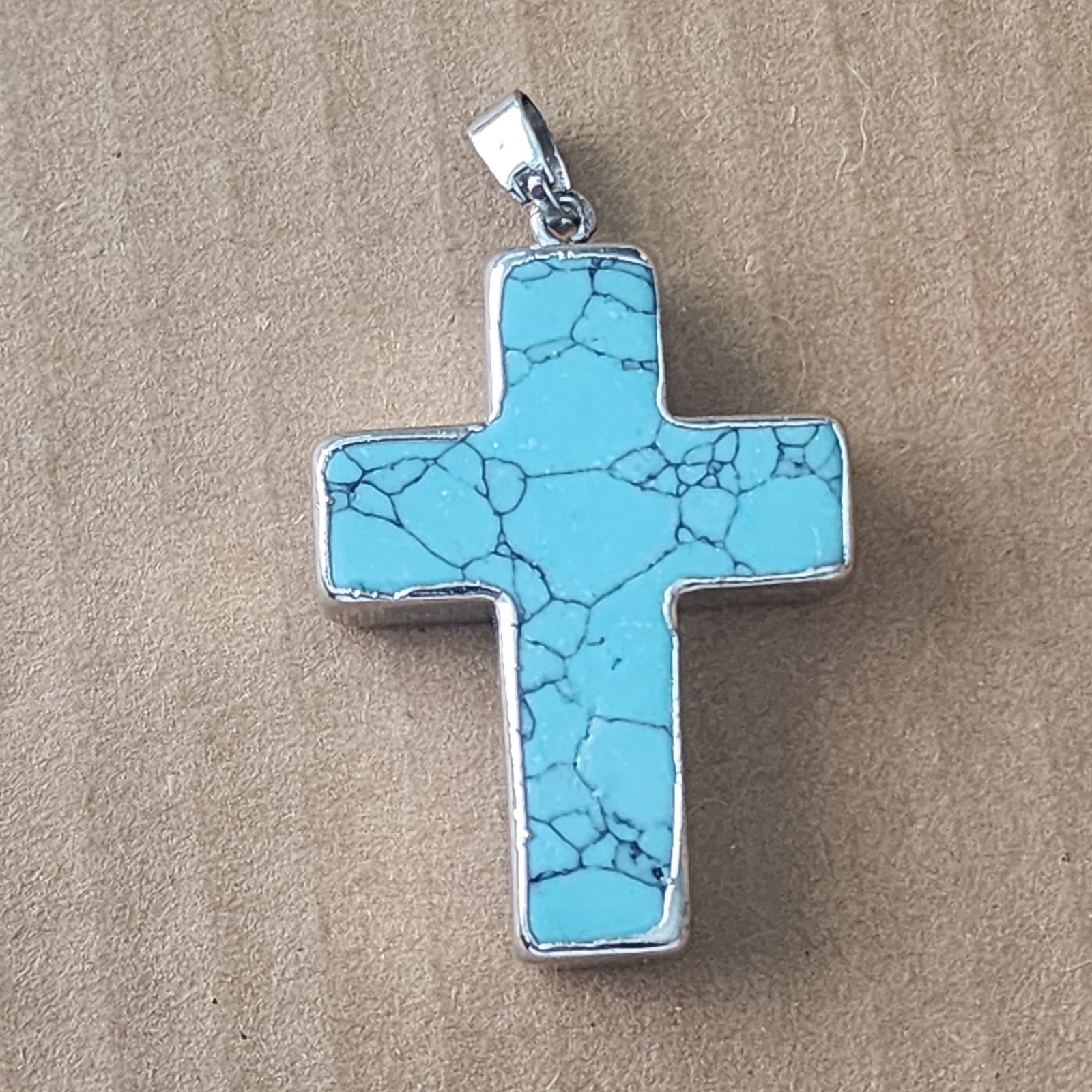 Beautiful Turquoise colored Cross Charm