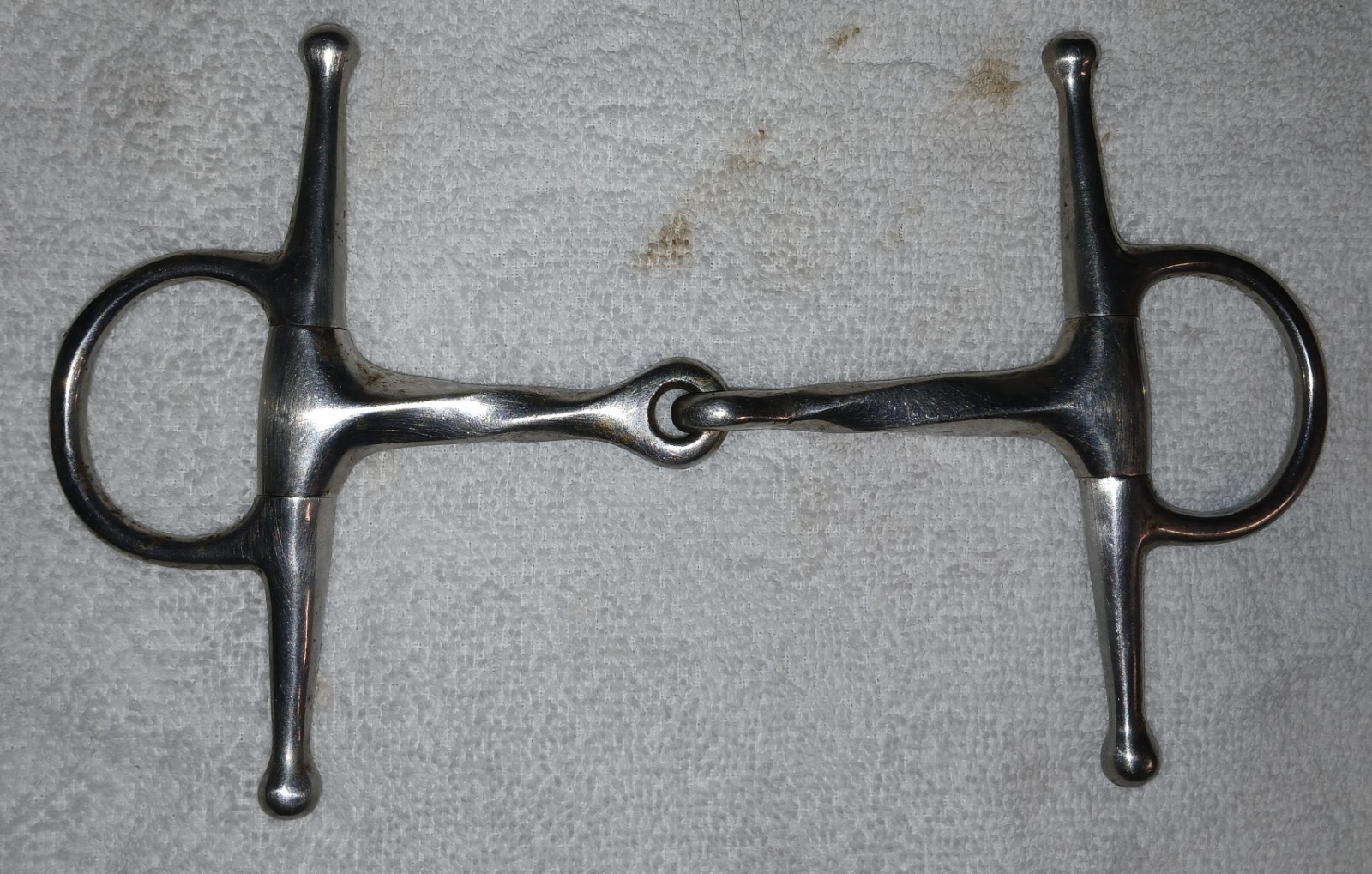Used maker marked full cheek snaffle Bit 4 3/8"   mouth  slow twist pony hunter
