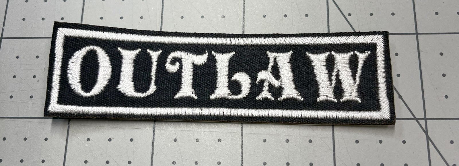 OUTLAW 4" x 1" White with White border motorcycle patches for vests