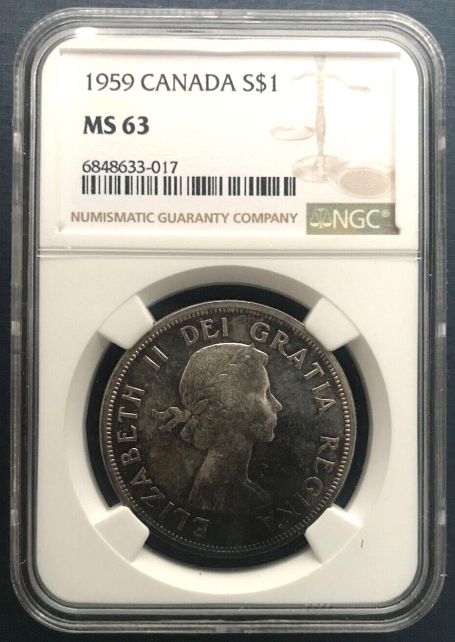 🇨🇦🇨🇦 Canada  1959 1 Dollar Royal Canadian Mint. NGC Graded MS 63 🇨🇦🇨🇦