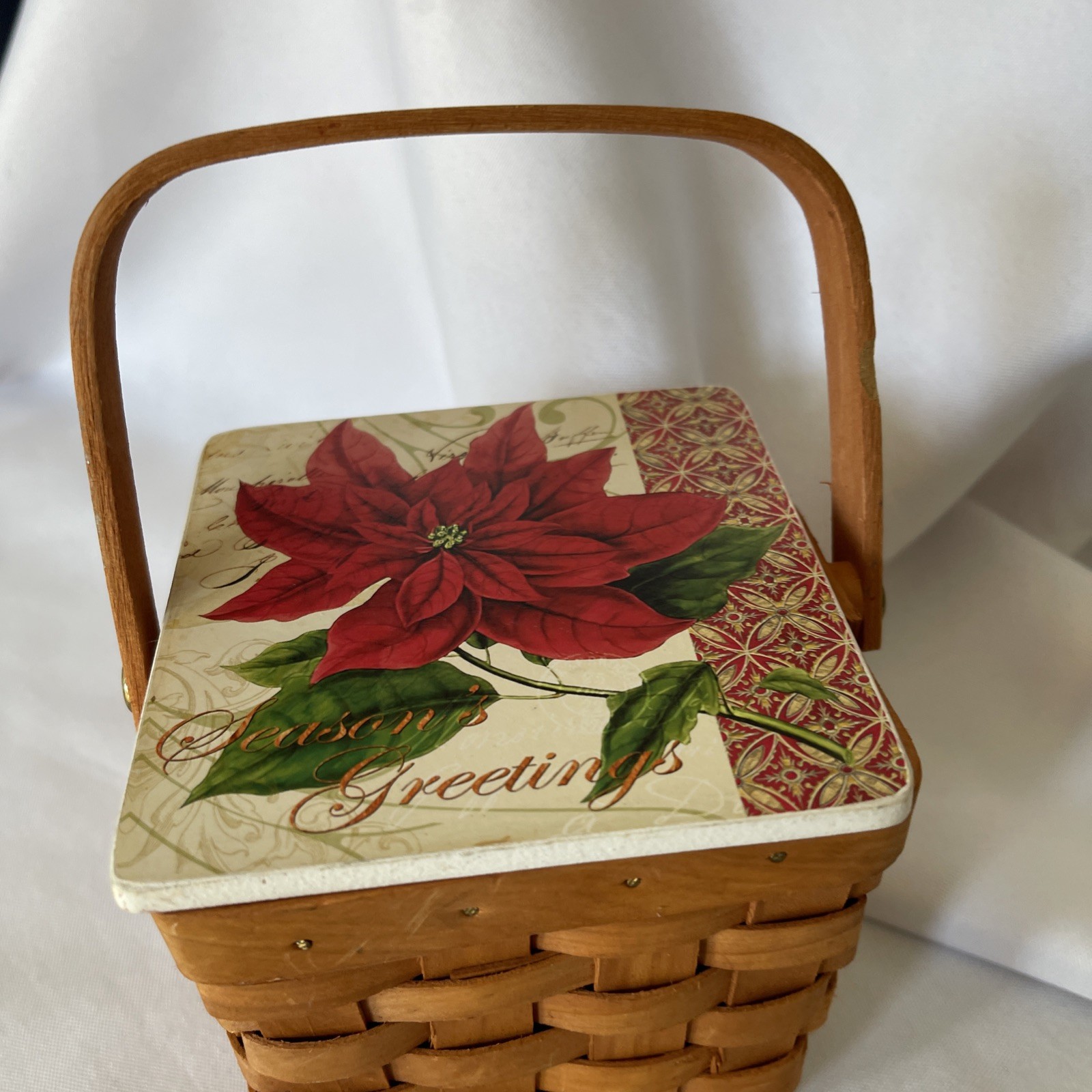 Small Basket With Ceramic Lid Featuring Poinsettia Season Greetings