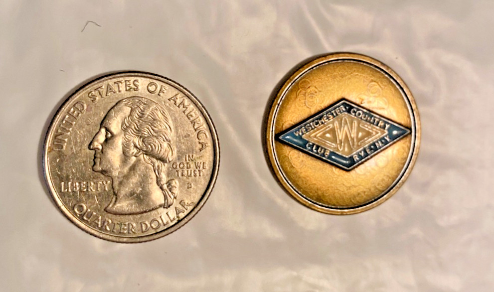 WESTCHESTER COUNTRY CLUB, RYE, NEW YORK, 1"-coin style metal golf ball marker.