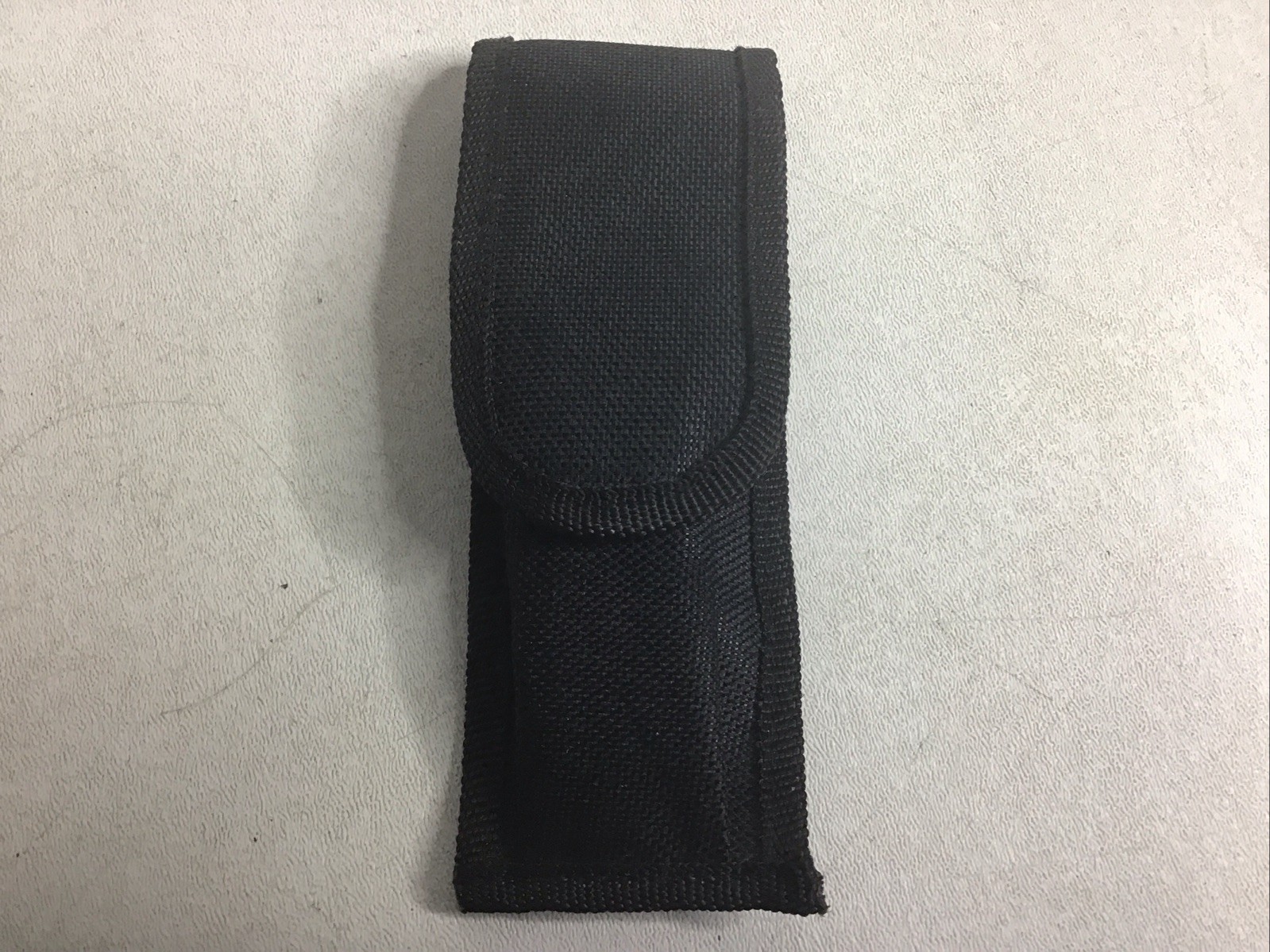 Nylon flashlight holder