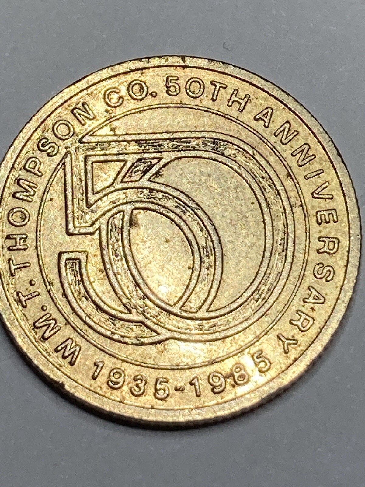 23mm 1985 "Wm. T. Thompson" (Vitamins) 50c Los Angeles, California Defunct #qL1