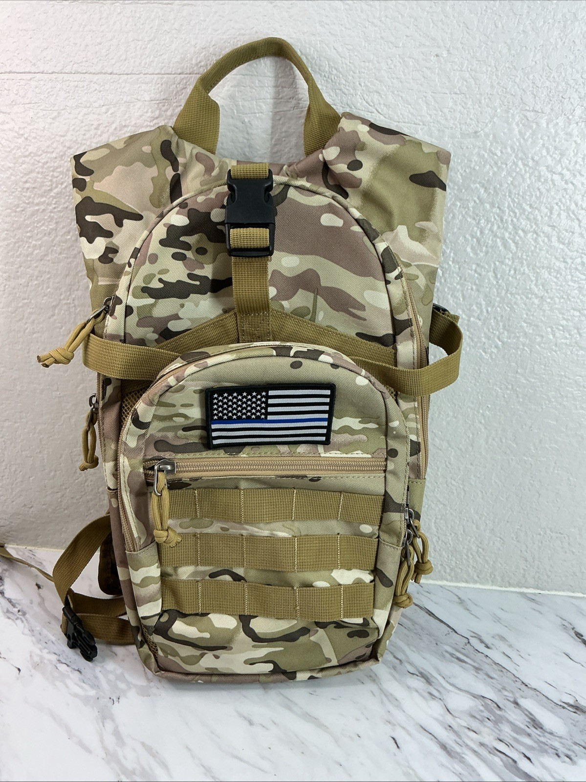 Tactical MOLLE Hydration Backpack with a camouflage pattern.No bladder.(sku#M1)