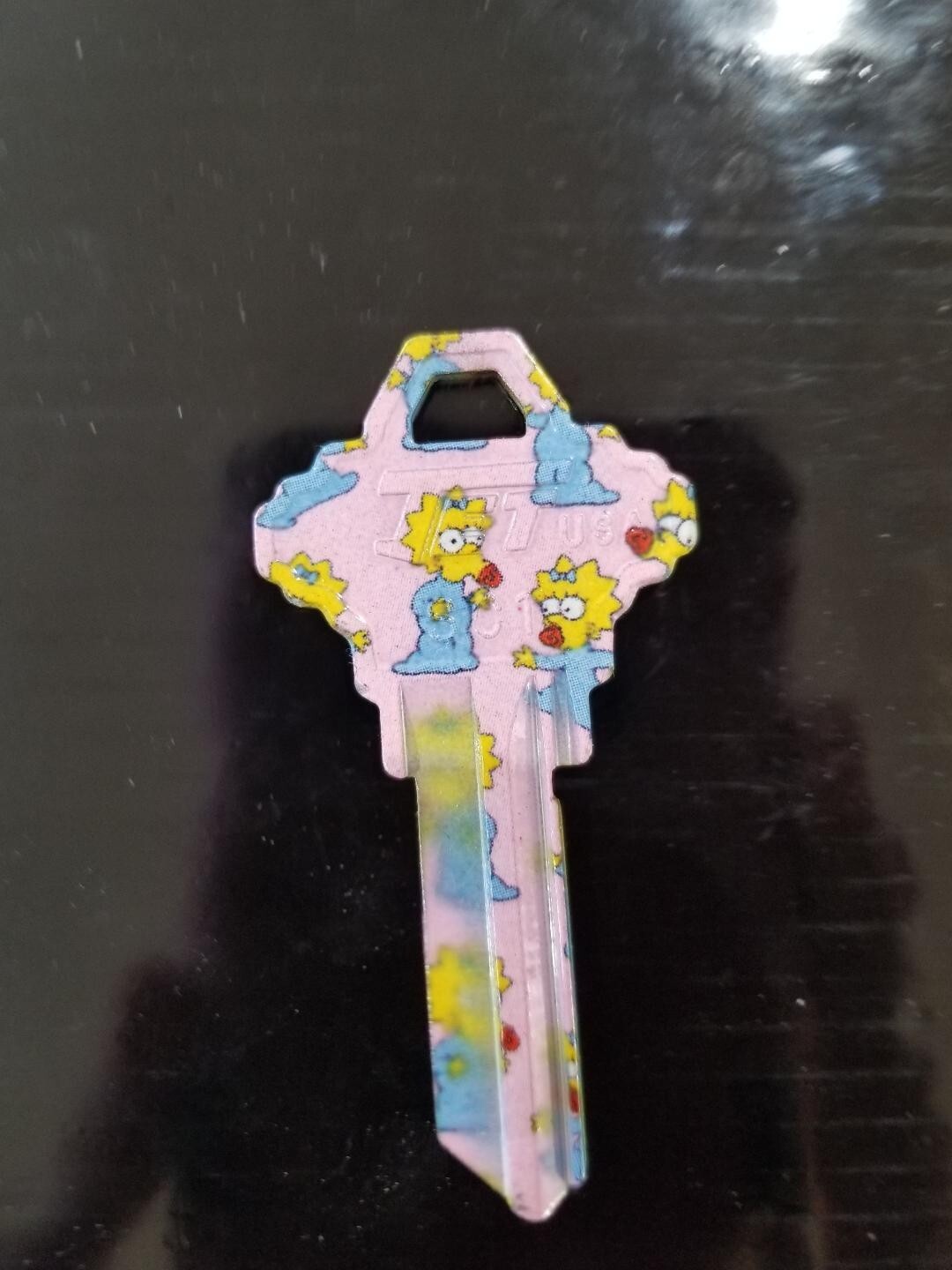 MAGGIE SIMPSON PRINTED SCHLAGE SC1 KEYBLANK (DISCONTINUED) - READ DETAILS BELOW