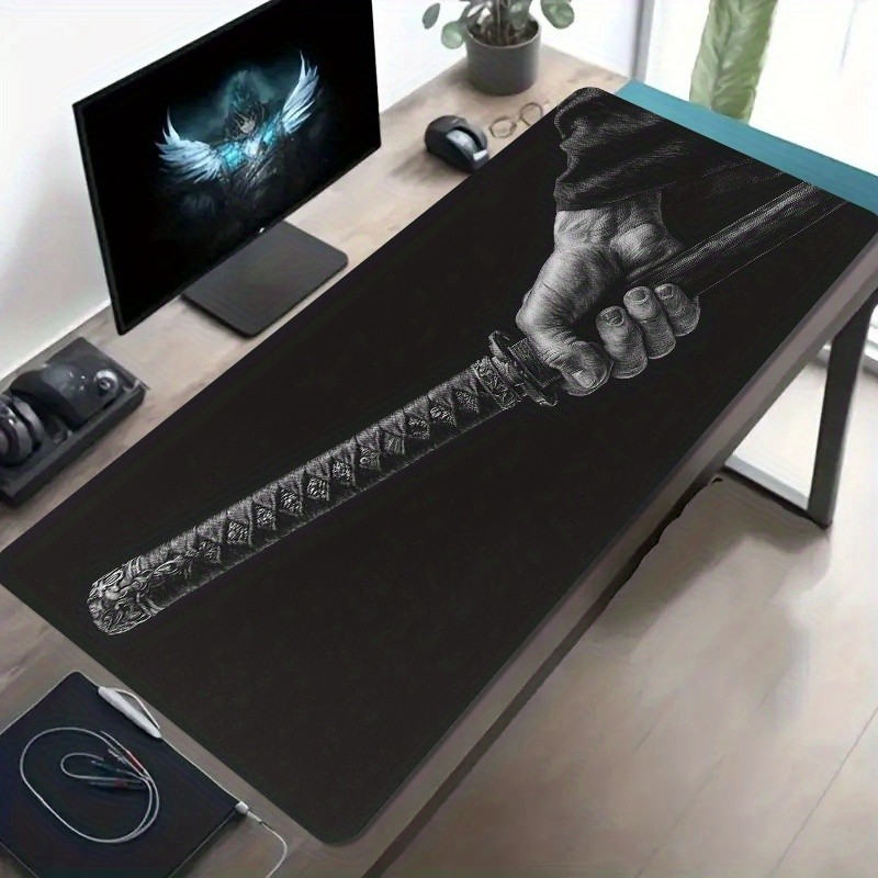 A Large Gaming Mouse Pad Featuring a Black And White Samurai Sword Grip Design