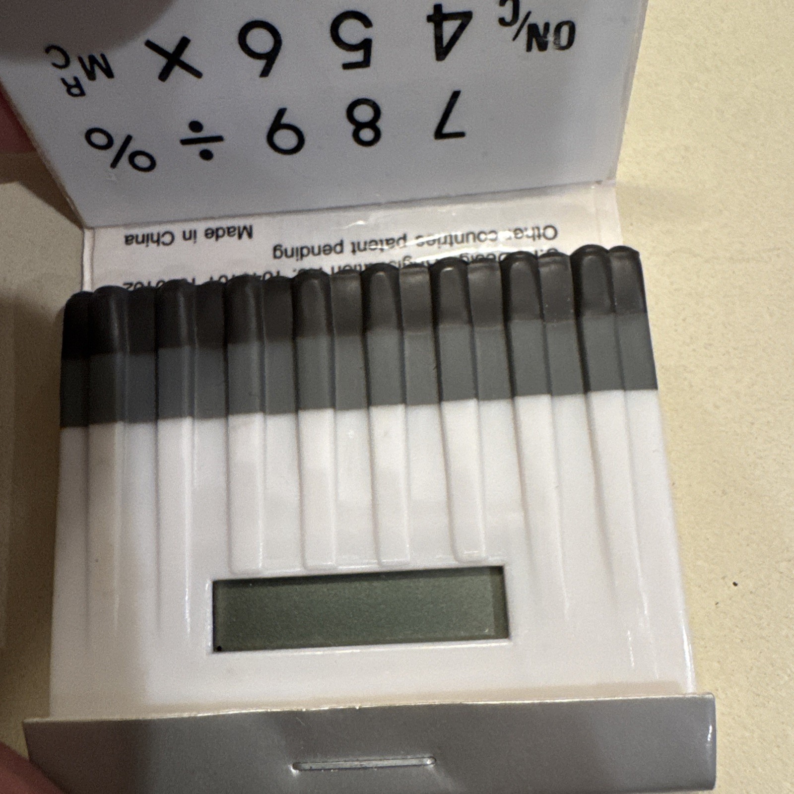 Neiman Marcus Calculator Shaped like Matchbook - silver, does not work