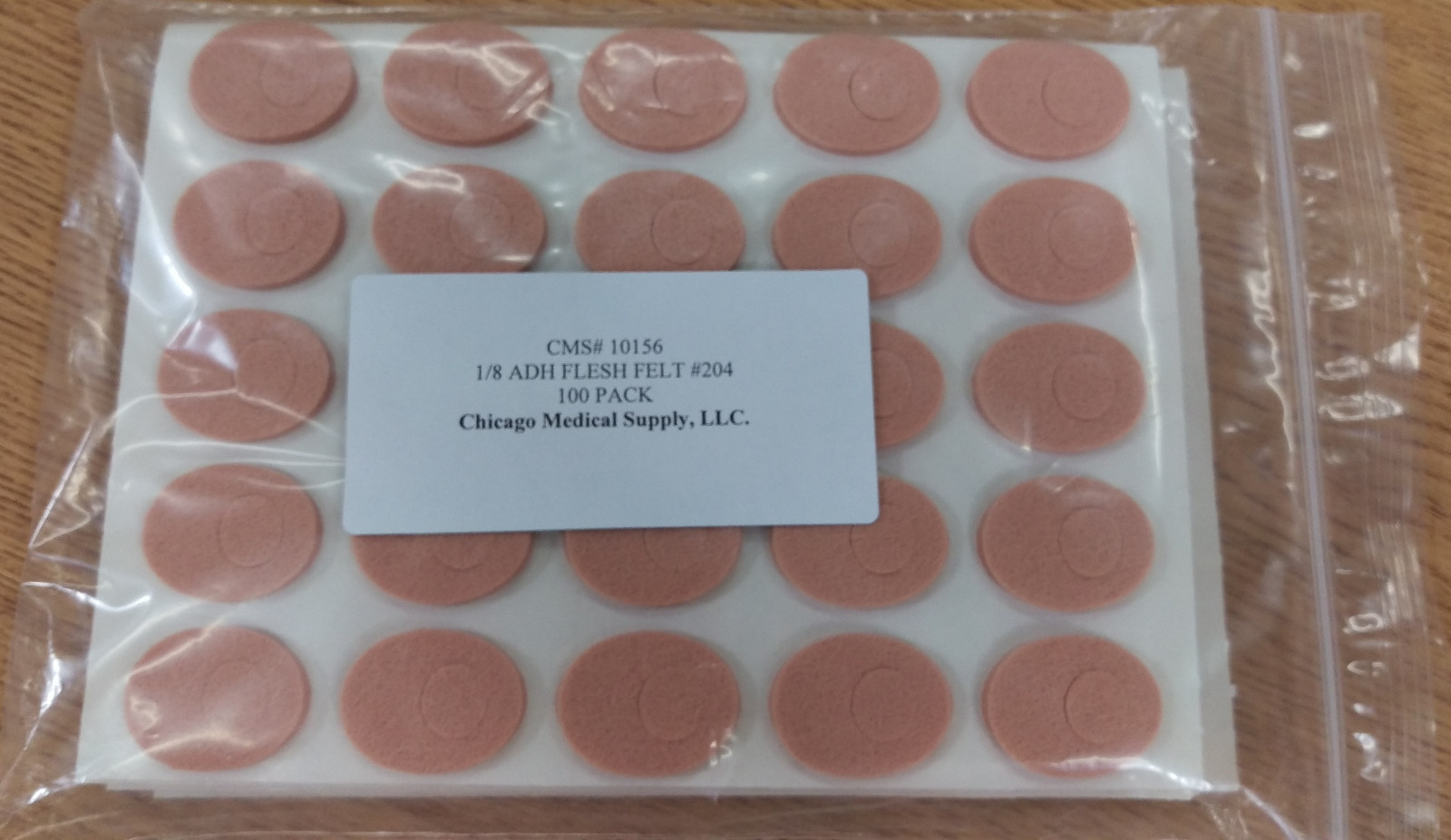 Superior Felt #204 Adhesive 1/8'' Wool Flesh Pre-cut Corn Pads 100/BG MPAD-023