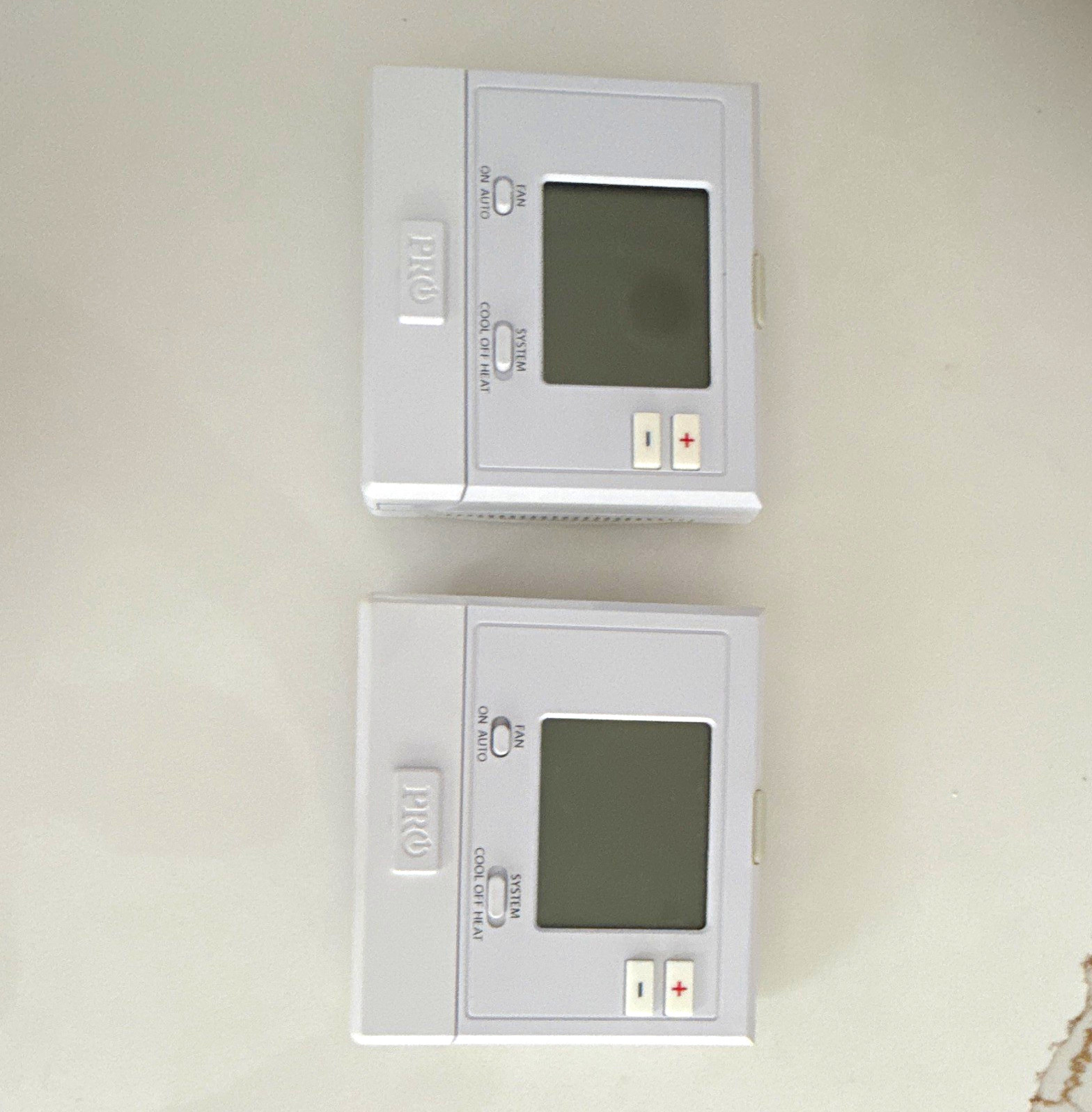 Pro1 Lot of 2 Non-Programmable Digital Thermostats Heat/Cool/Off White 1H/1C