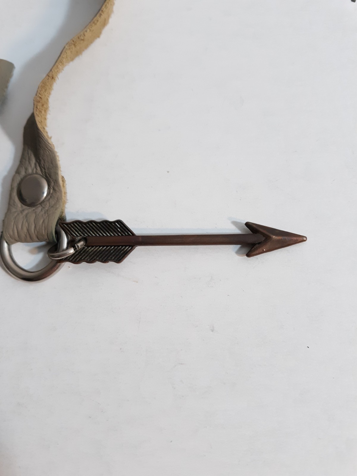 Leather Strap And Non Metallic Arrow Accent Measures 2.5" Long