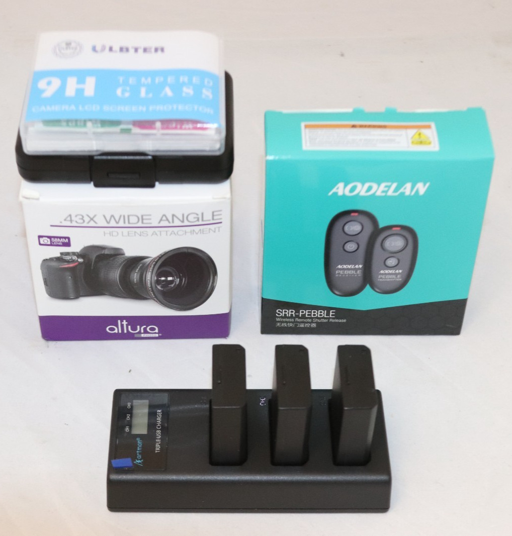 camera equipment .43x wide angel lens, shudder release remote, battery charger