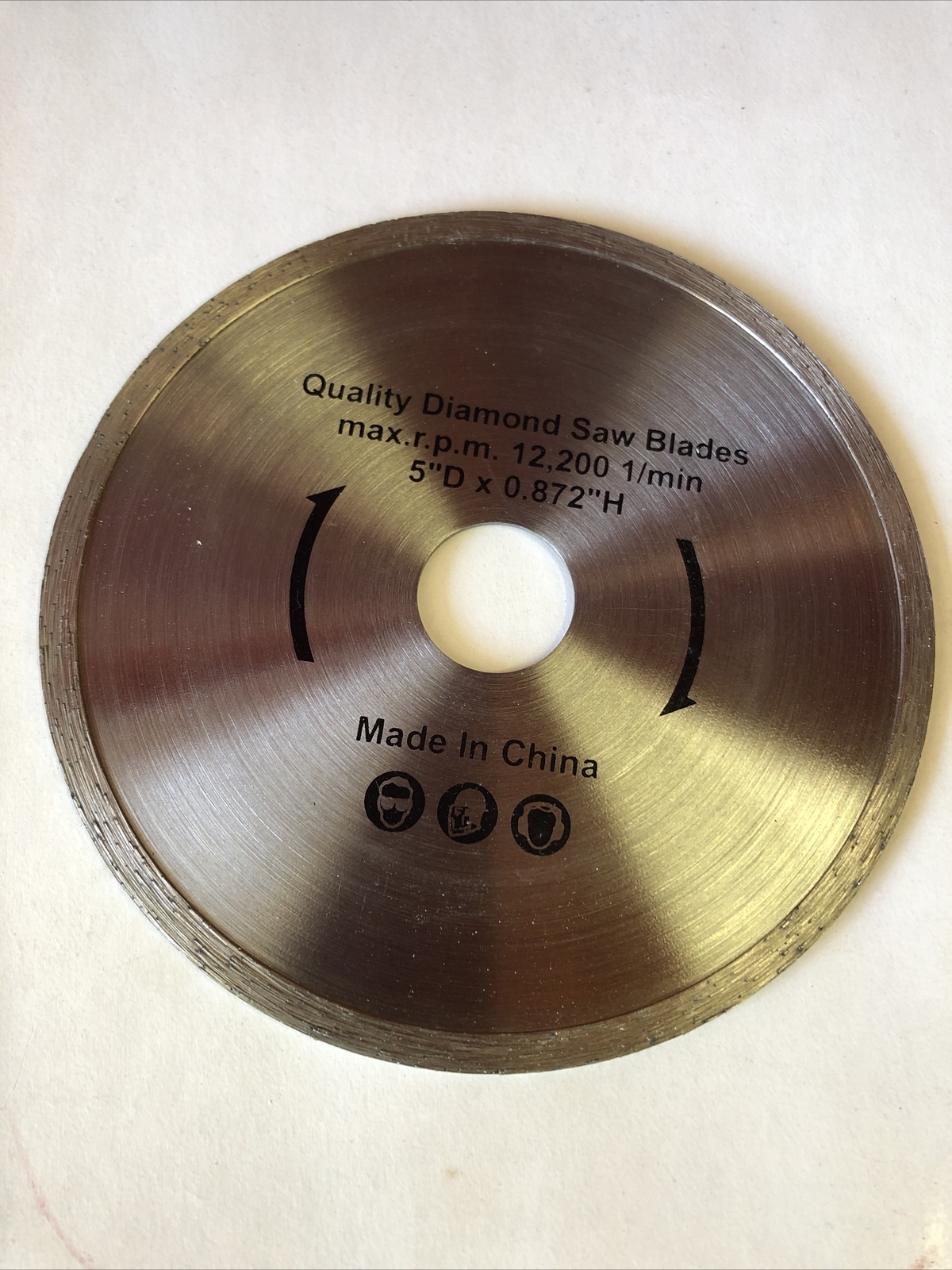 5 inch diamond blade 7/8” Arbor. Continuous Rim. Comes with 5/8" adapter