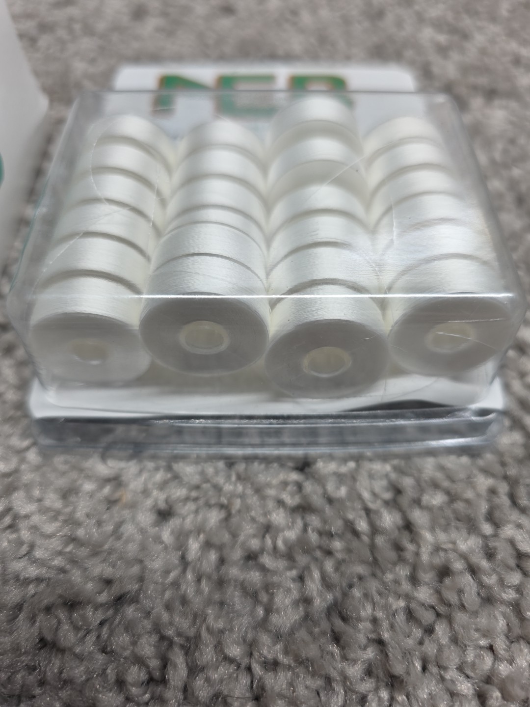 NEB National Embroidery Prewound Bobbins. White Machine Thread
